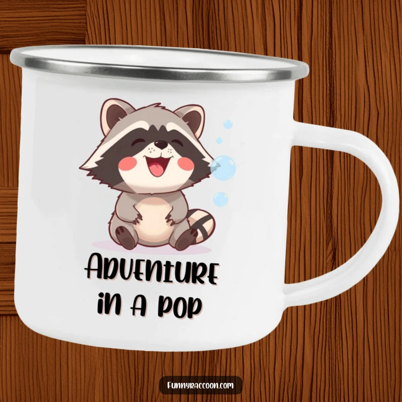 Funny raccoon with a wide, happy grin is featured on a camping mug, trying to catch floating bubbles in an outdoor setting.