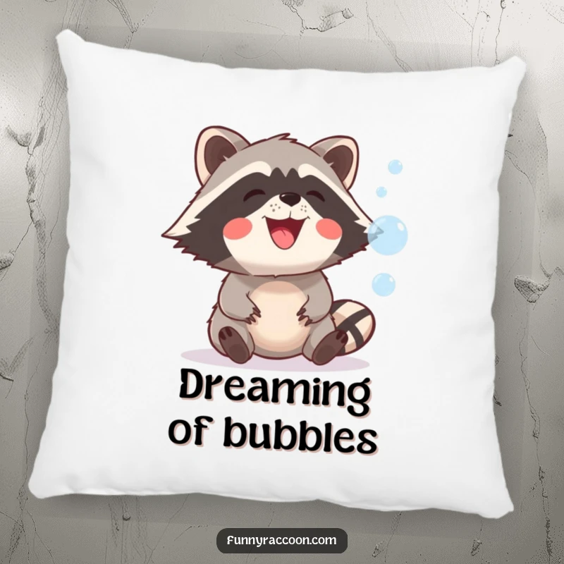 A soft pillow featuring a funny raccoon with a wide, happy grin attempting to catch floating, colorful bubbles.