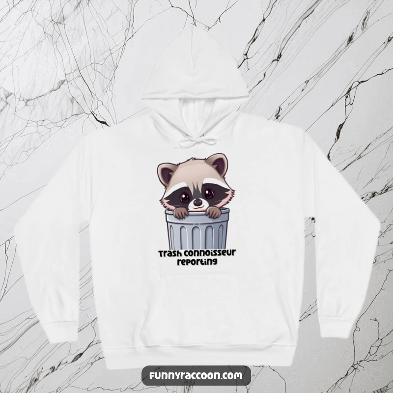 Funny kawaii raccoon hoodie, a cute raccoon peeking curiously out of a trash can, offering warmth and playful charm.