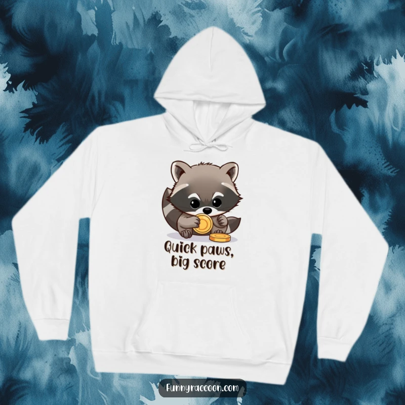 Funny raccoon hoodie featuring a mischievous raccoon stealing a shiny coin, warm and humorous apparel.