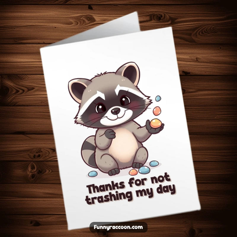 Funny Free Printable Thank You Card: A cute raccoon juggling pebbles, sending a unique thank you message.
