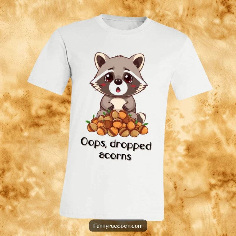 Funny raccoon t-shirt, wide-eyed shock, dropping a messy pile of acorns, tiny ears alert, humorous and relatable apparel.