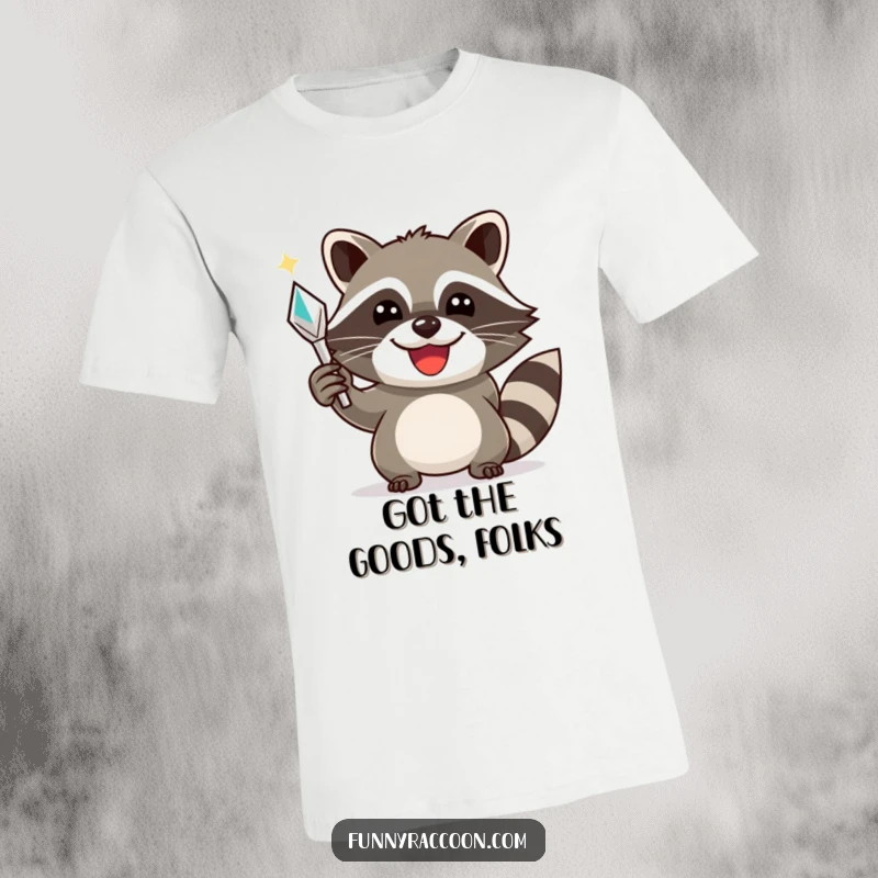 Funny raccoon t-shirt, a smiling raccoon triumphantly holding a shiny object, symbolizing success and playful acquisition.