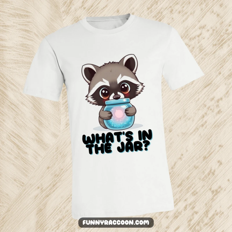 Funny raccoon t-shirt showing a cute raccoon with large, curious eyes peering intently into a sparkling jar.