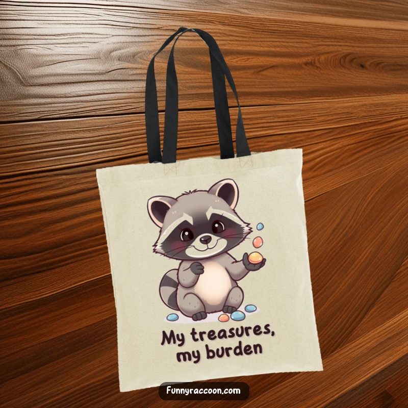Funny tote bag designed with a cute raccoon artistically juggling a pile of shiny pebbles, illustrating its impressive dexterity and playful nature.